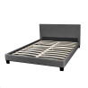Lit en tissu gris foncé avec tête de lit et sommier Feutrine
