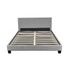 Lit en tissu gris clair avec tête de lit et sommier Feutrine
