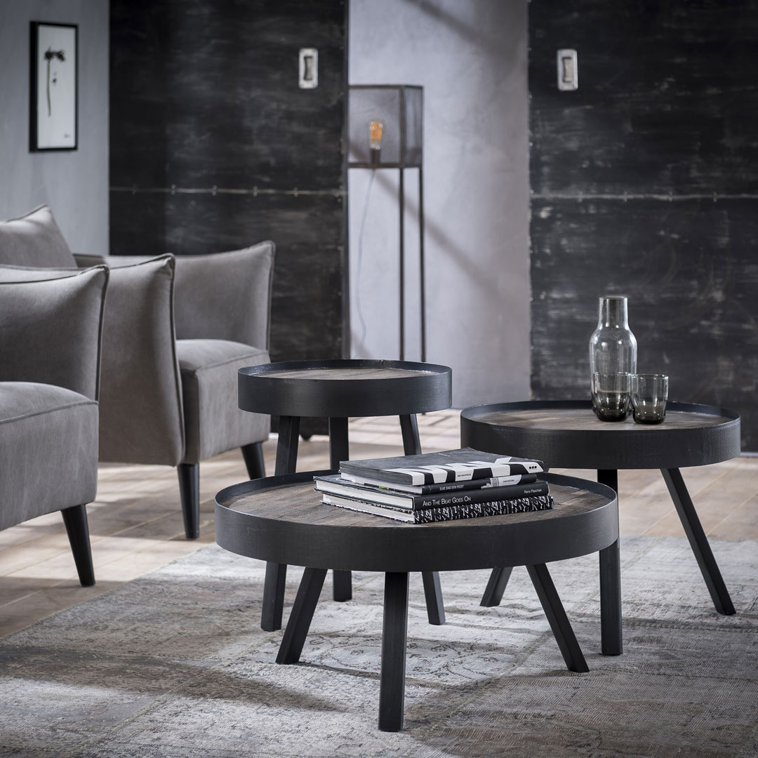 Table basse ronde industrielle en bois massif avec piétement métallique