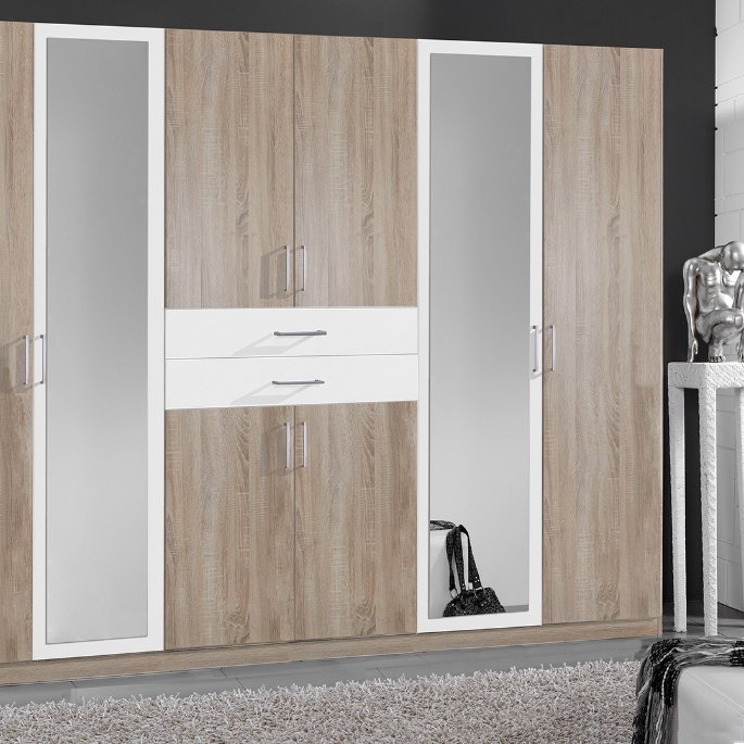 Vantail coulissant en bois clair dans une chambre contemporaine
