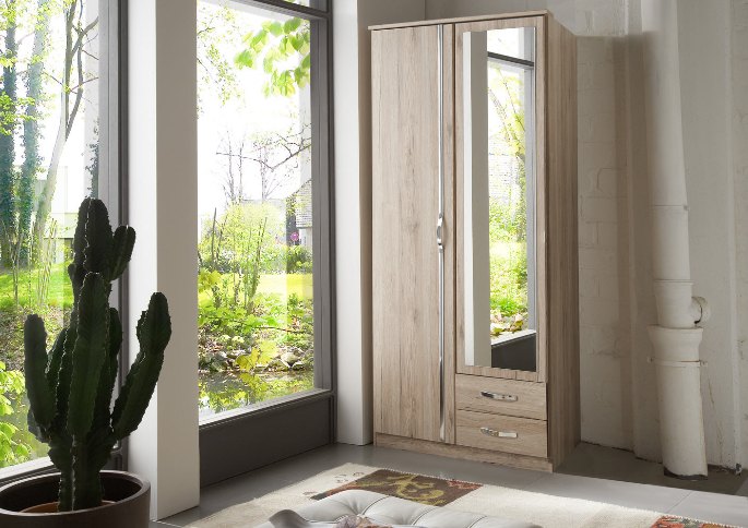 Penderie deux portes de 91 cm de large dans une chambre