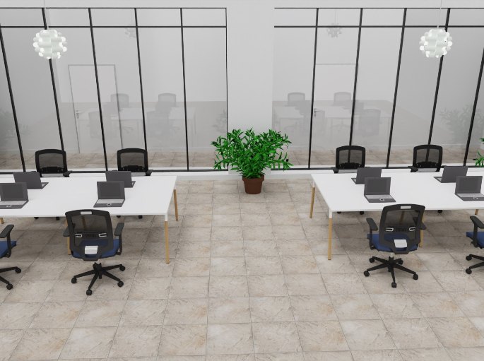 Zone de travail sous de hautes verrières avec grandes plantes en bacs
