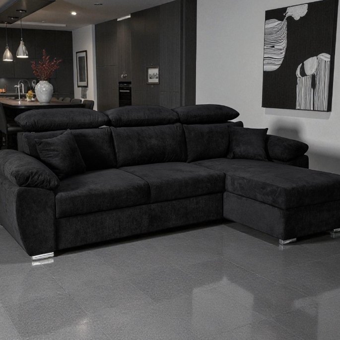 Couchage d’appoint sombre installé dans un séjour contemporain