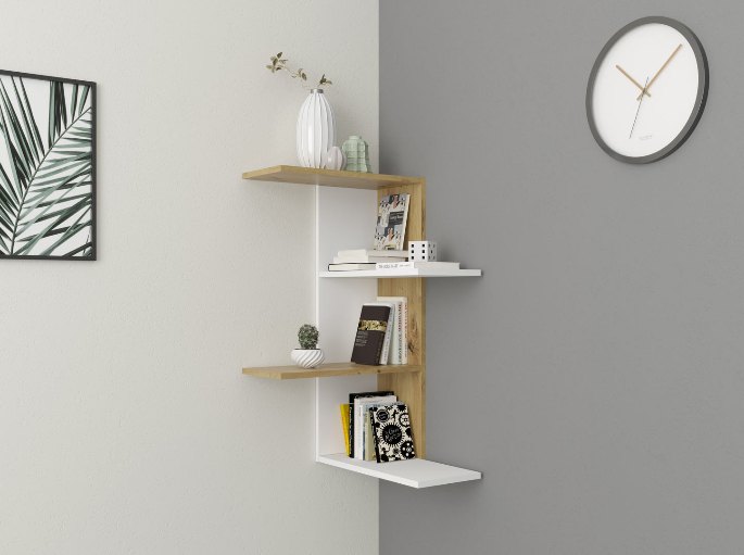 Tablettes blanches et bois installées en escalier dans un angle de mur clair