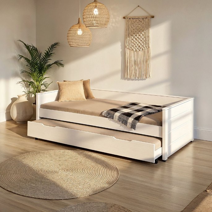 Deuxième matelas escamotable rangé sous le sommier principal