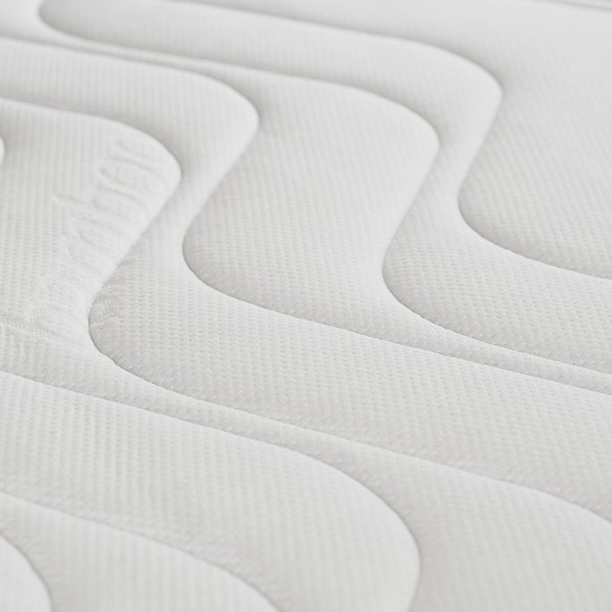 Toile matelassée claire sur laquelle les traces se repèrent facilement