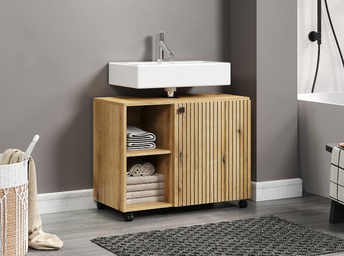 Plan de toilette de 80 cm installé entre deux murs dans une petite salle d’eau