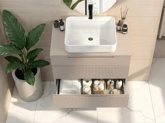 Tiroir profond ouvert sous un plan de toilette à cuve posée