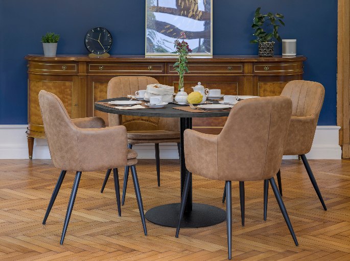 Embase ronde métallique dégageant le sol sous une table de repas