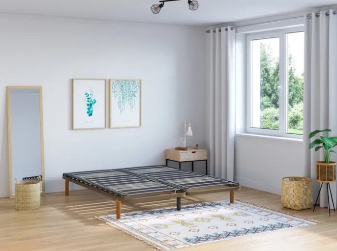 Chambre lumineuse avec deux cadres à traverses juxtaposés formant un couchage de 160 cm