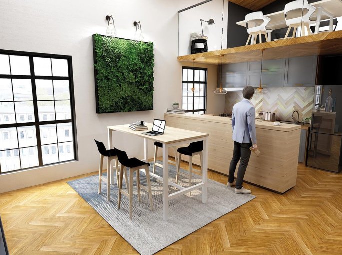 Grand plateau haut en bois face à une cuisine d'entreprise, avec tabourets hauts