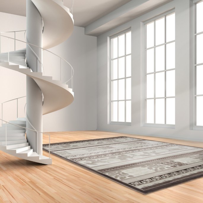 Intérieur très lumineux où une surface claire dessine la zone de circulation