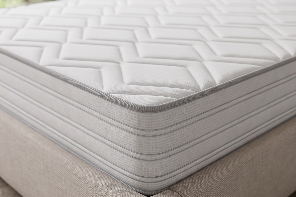 Angle du matelas Sillon : coutil polycoton et bande latérale